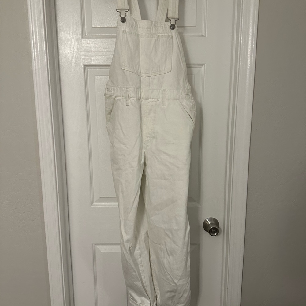 White Levi’s overalls